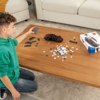 Ravensburger-11557 3D Puzzle - Porsche 911 GT3 Cup (mit Gitter)